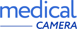Logo mit dem Text 'medical CAMERA' in blauer Schrift. Das Wort 'medical' ist größer und fett gedruckt, während 'CAMERA' darunter in Großbuchstaben steht.